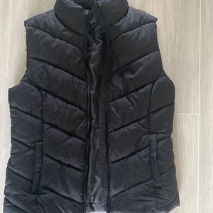 Black puffy vest